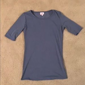 A blue short sleeve top
